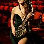 the best girl saxophonist, book a saxophonist Switzerland, a saxophonist for a wedding Italy, a saxophonist for a corporate event, the best saxophonists Zurich, Basel, Bern
